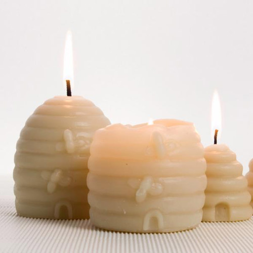 queenb candle in shape of a beehive